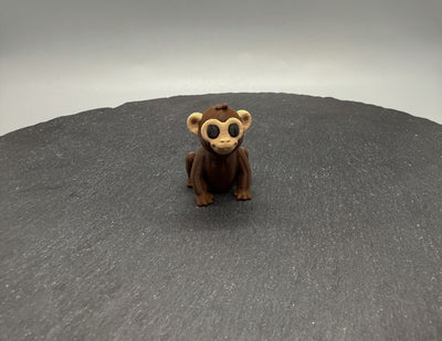 Articulated Baby Monkey – 3D-printed articulated flexi fidget toy by 3DHotshop