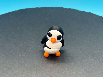Articulated Mini Penguin – 3D-printed articulated flexi fidget toy by 3DHotshop
