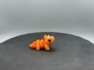 Articulated Triceratops – 3D-printed articulated flexi fidget toy by 3DHotshop