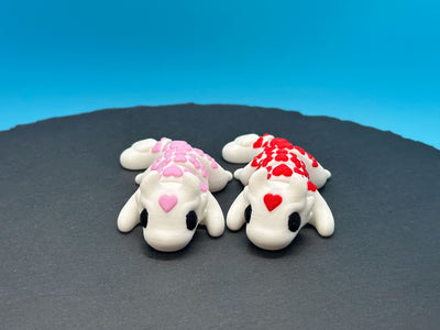 Articulated Valentines Dragons – 3D-printed articulated flexi dragon fidget toy by 3DHotshop