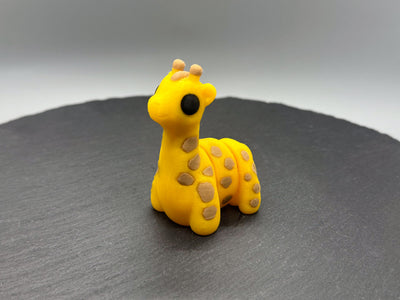 Articulated Baby Giraffe – 3D-printed articulated flexi fidget toy by 3DHotshop
